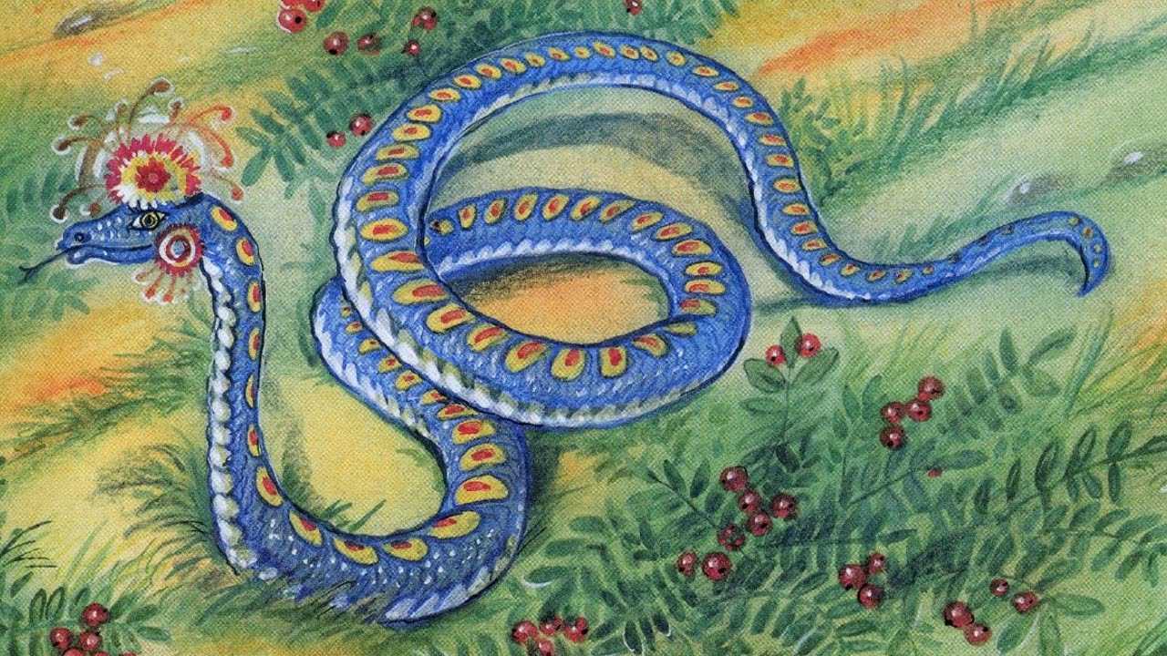 A blue snake with yellow spots Description automatically generated