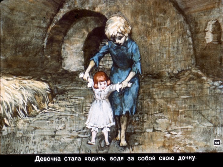 A person and a child in a stone tunnel Description automatically generated